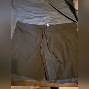 Brand new black swim shorts